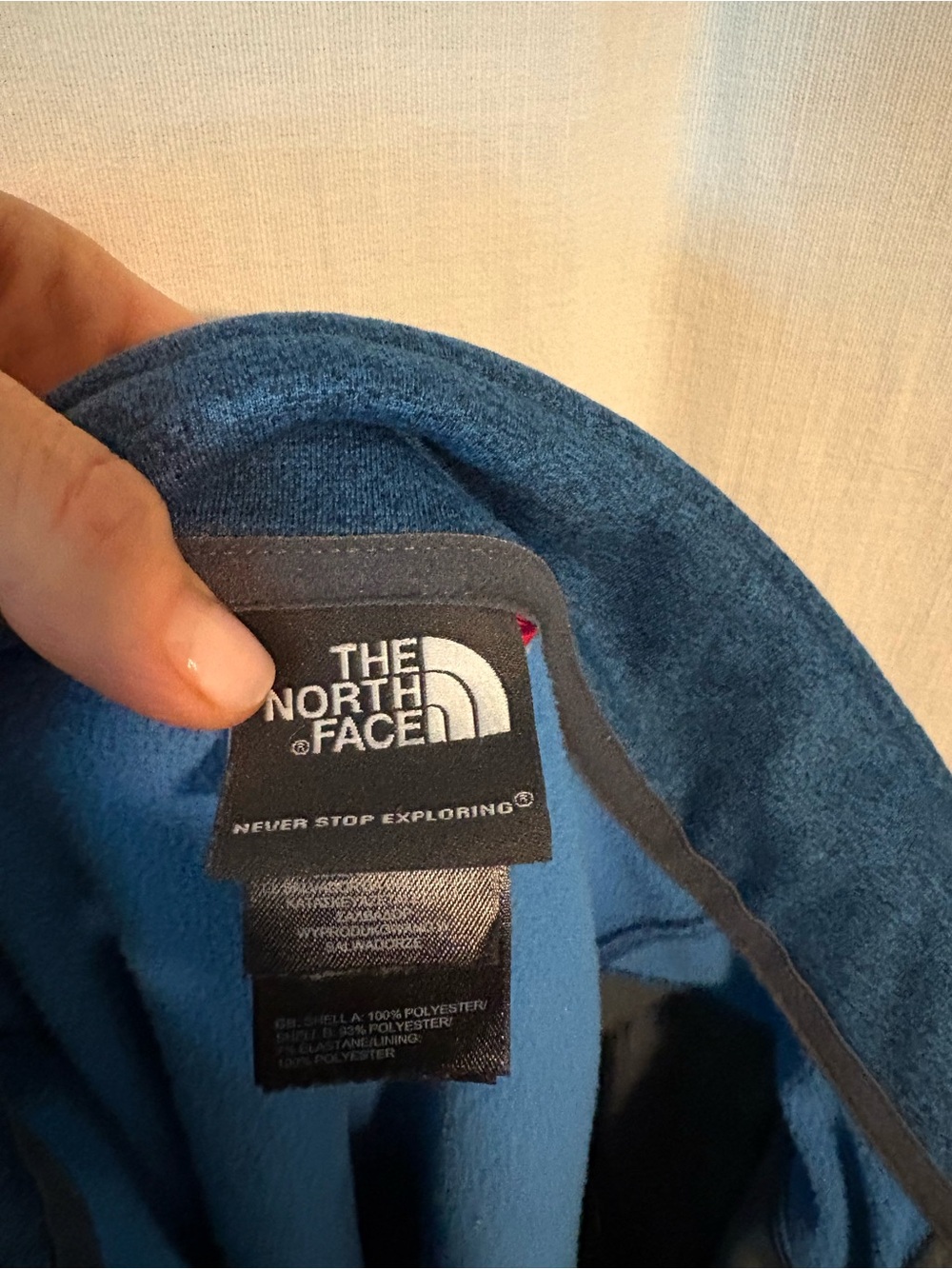 The North Face Men’s Blue 1/4 zip pullover- Logo Detail
